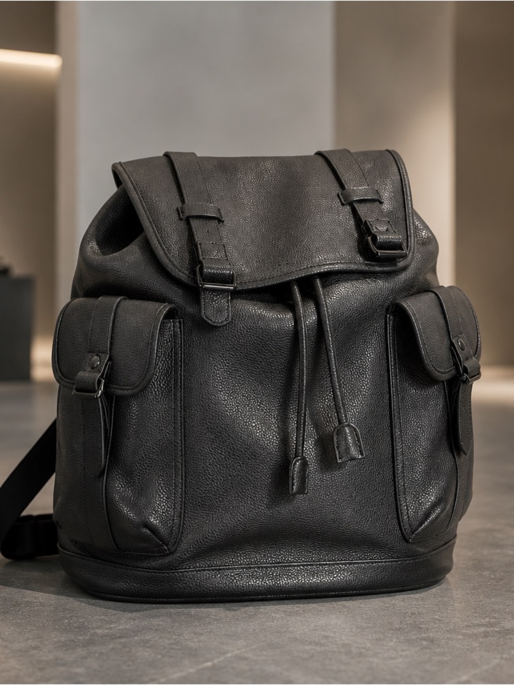 Bugatti Black Leather Men's Backpack with Front Flap and Side Pockets